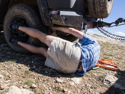 Repairing a leaking tire during the Bighorns trip