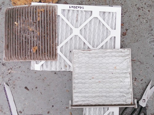 Replacement cabin air filter installed behind the glove box
